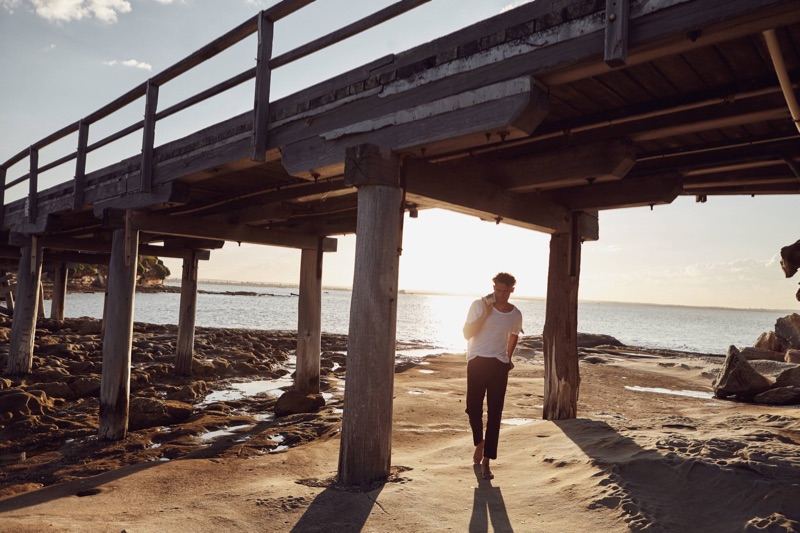 Broed wears t-shirt Venroy, jacket Stutterheim, and pants COS.