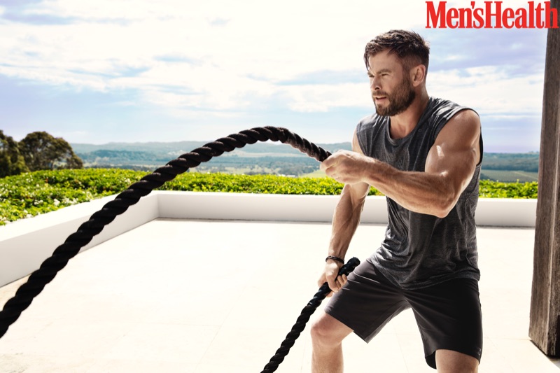 Working out, Chris Hemsworth appears in a new photo shoot for Men's Health.