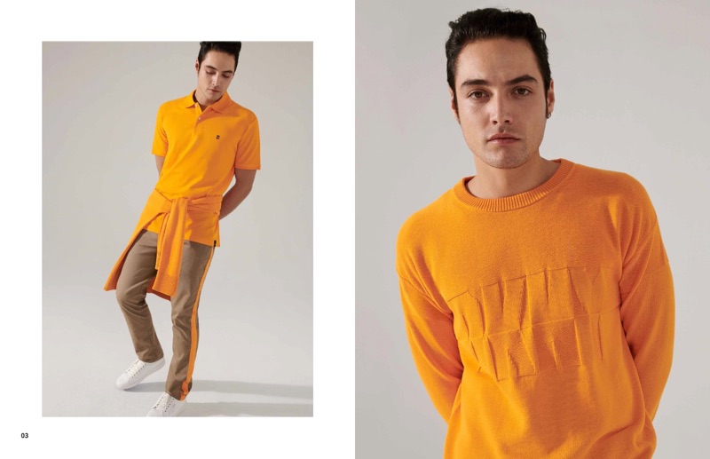 Standing out in orange, Levi Dylan wears DKNY.