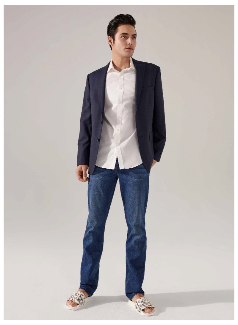 Embracing a smart casual look, Levi Dylan models DKNY.