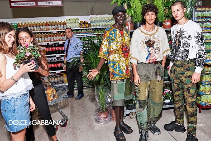 Taking to a market, Baba Diop, Francisco Henriques, and Janusz Kuhlmann front Dolce & Gabbana's spring-summer 2019 campaign.