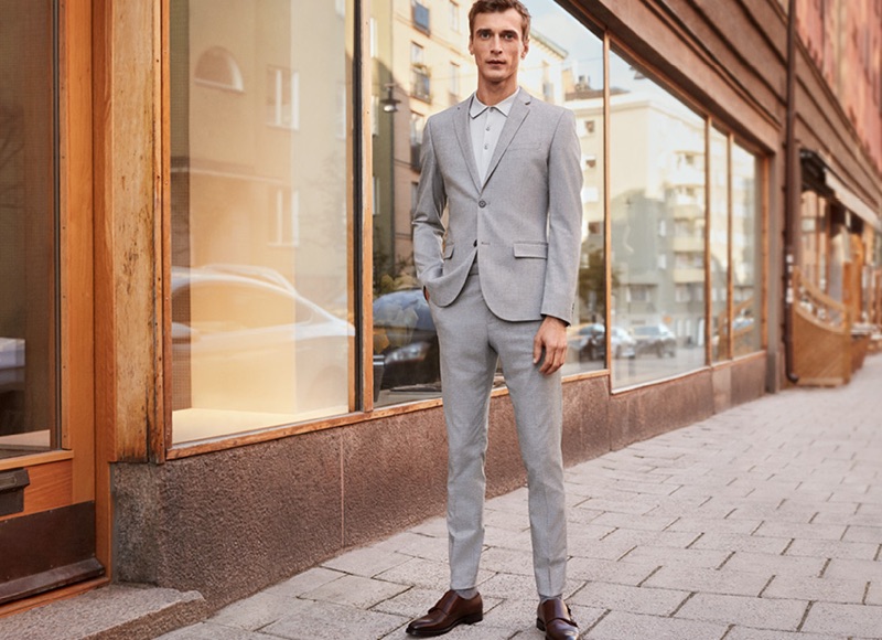 Clément Chabernaud sports a light grey skinny fit suit by H&M.