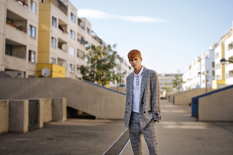 Presley Gerber dons a check suit for HUGO's spring-summer 2019 men's campaign.