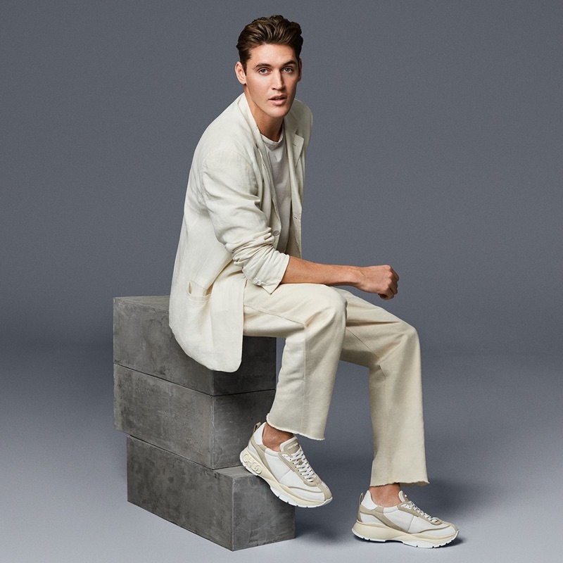 Sporting sneakers, Isaac Carew connects with Jimmy Choo for spring-summer 2019.