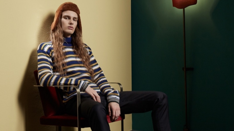 Sporting a striped sweater, Sair Tan appears in Luca Larenza's fall-winter 2019 lookbook.