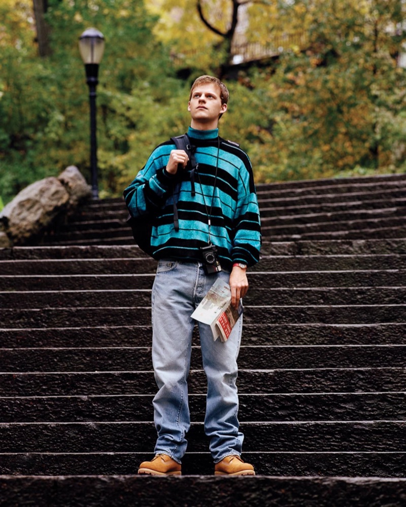 Starring in a photo shoot, Lucas Hedges wears a Balenciaga sweater, vintage Levi's jeans, and Timberland boots.