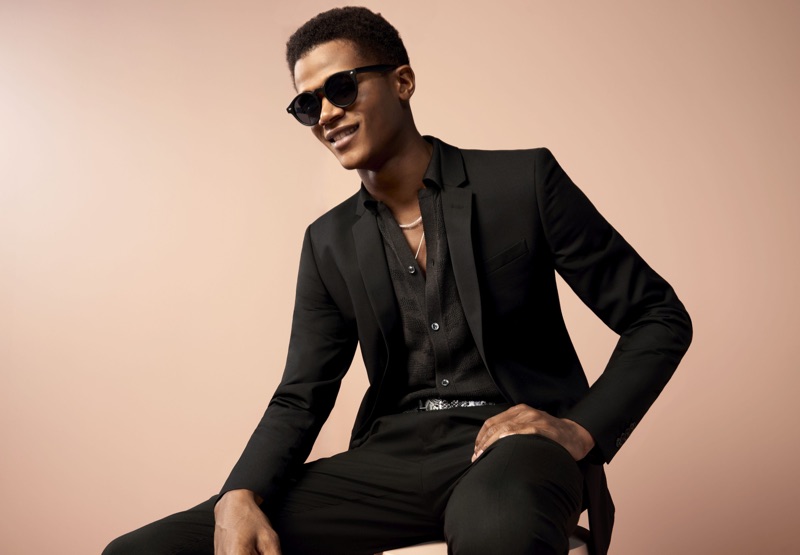 A sleek vision, O'Shea Robertson suits up for River Island's spring 2019 campaign.