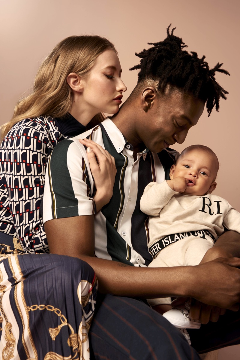 Ty Ogunkoya poses with his family as part of River Island's spring 2019 campaign.