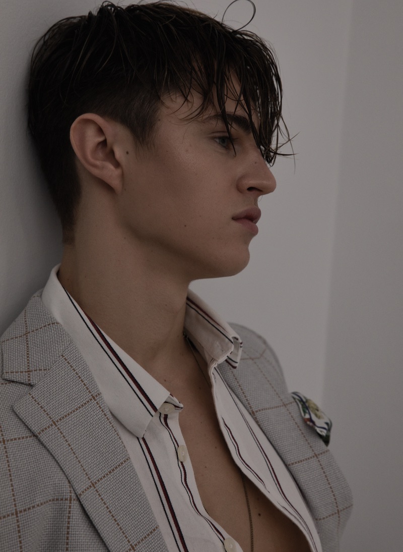 Sebastian wears handkerchief Eterna, jacket Reserved, and shirt Samsøe & Samsøe.