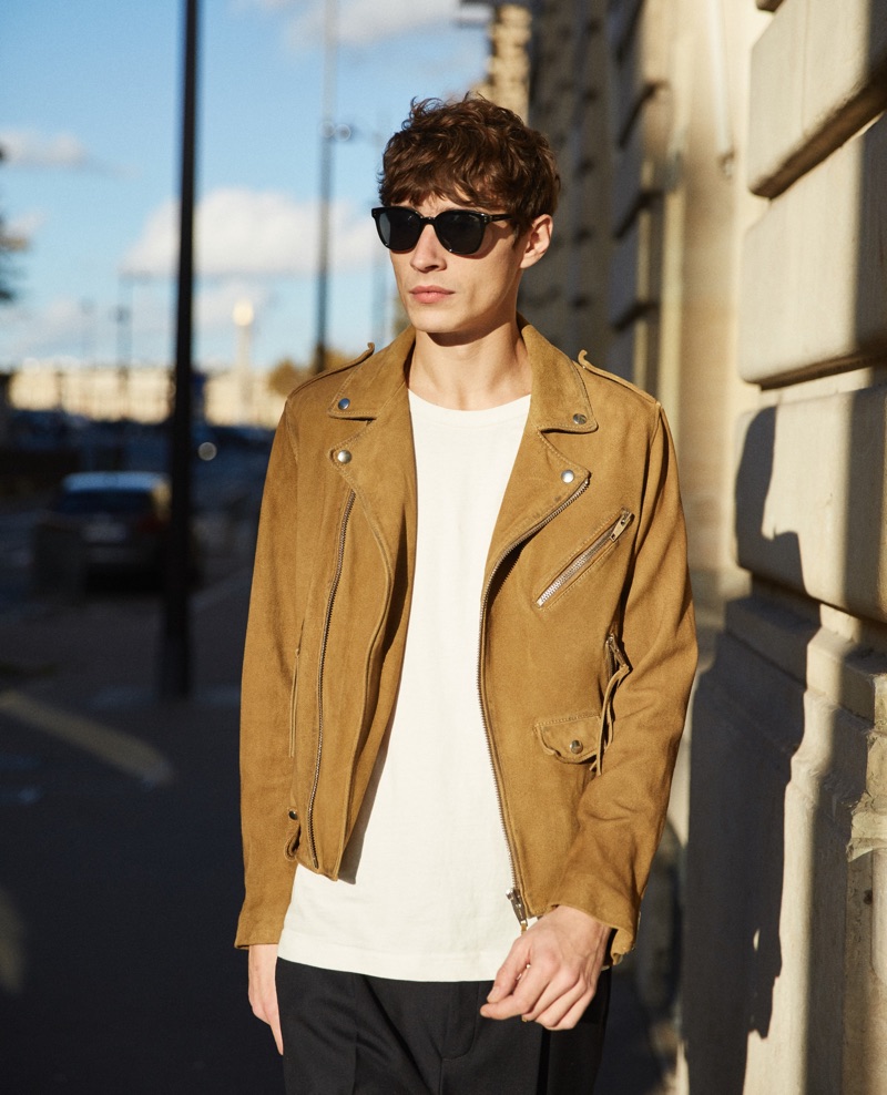 A cool vision, Adrien Sahores rocks a biker jacket by The Kooples.