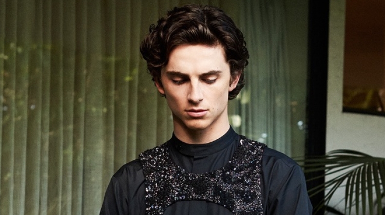 Donning his 2019 Golden Globes look, Timothée Chalamet poses for a photo shoot.