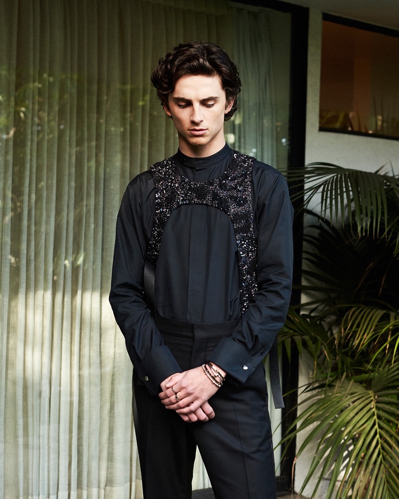 Donning his 2019 Golden Globes look, Timothée Chalamet poses for a photo shoot.