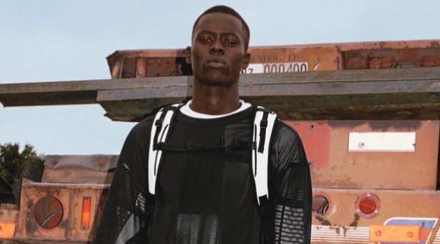 Alpha Dia Rocks Black & White for Y-3 Spring '19 Campaign Alpha Dia models a black and white outfit for Y-3's spring-summer 2019 campaign.