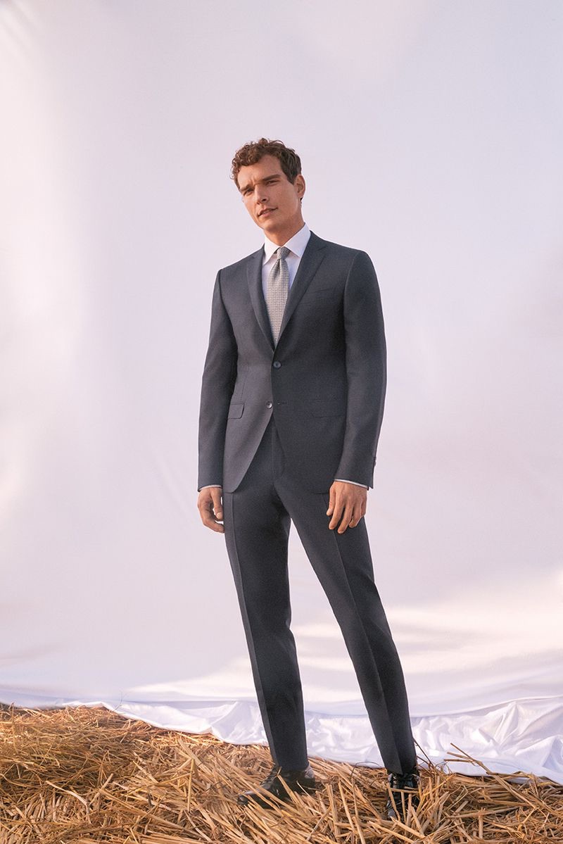 Alexandre Cunha sports a grey suit from Canali's spring-summer 2019 wedding collection.