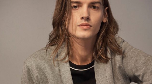 Good Sport: Christian Plauche Dons Smart Sporty Style for Club Monaco Christian Plauche sports a knit cardigan, pullover, and pleated chinos by Club Monaco.