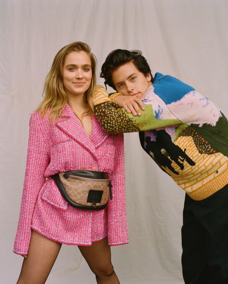 Posing with Haley Lu Richardson, Cole Sprouse wears a Louis Vuitton sweater.