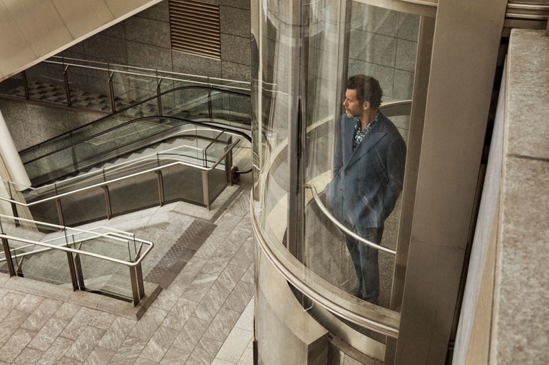 Taking the elevator, Craig Roberts is pictured in a sharp suit by Corneliani.