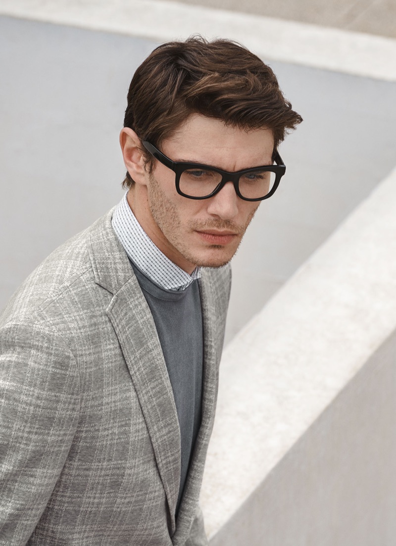 Donning black framed glasses, Julien Sabaud wears a look from Digel.