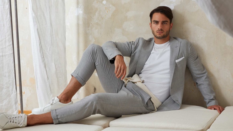 Aleksandar Rusić is a chic vision in a grey suit for Eleventy.