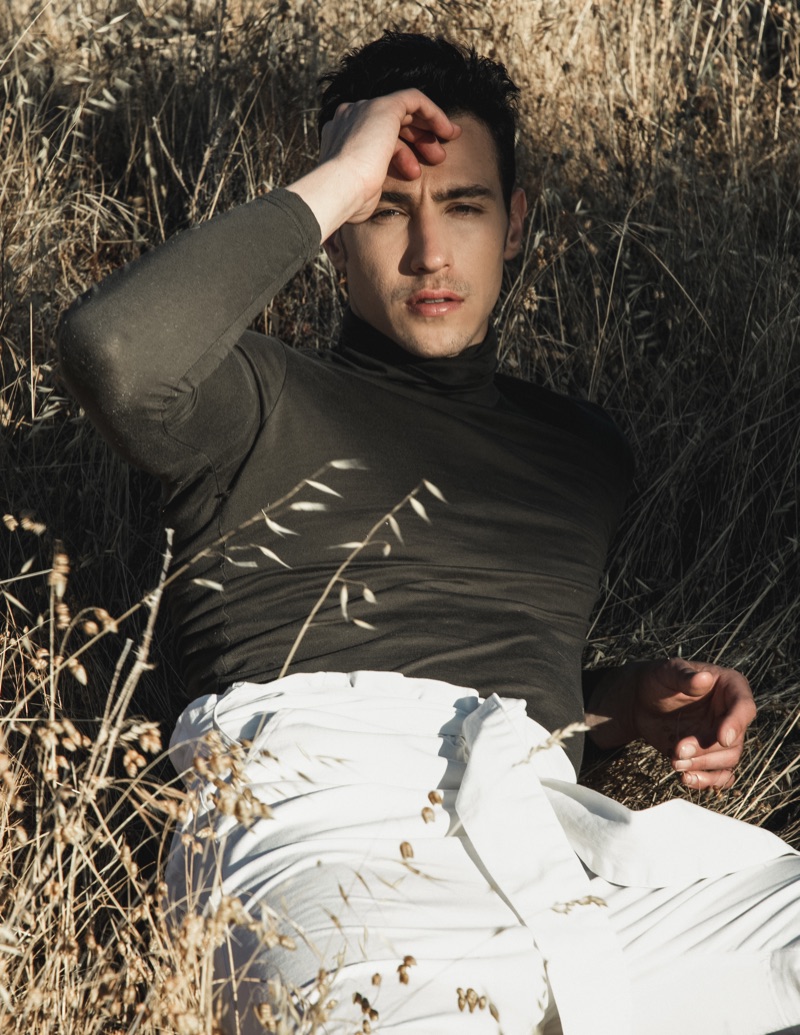 James wears turtleneck Helmut Lang and pants 3.1 Phillip Lim.