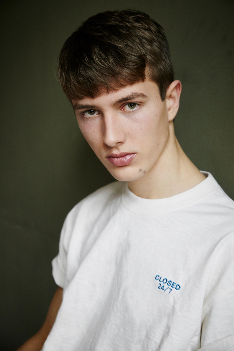 Modelwerk fresh face Felix Sauerbrey sports a Closed t-shirt.