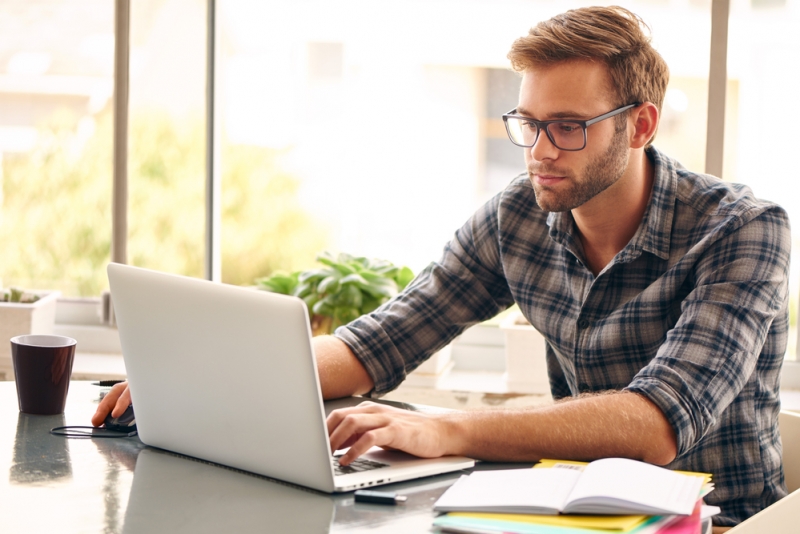 Guy in Glasses Laptop