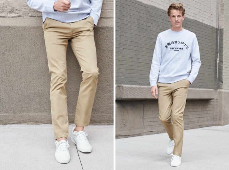 Making a case for classic casual style, Hugo Sauzay wears H&M's skinny chinos with a grey sweatshirt.