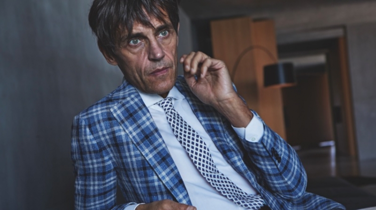 Didier Vinson dons a checked suit jacket by Luigi Bianchi Mantova.