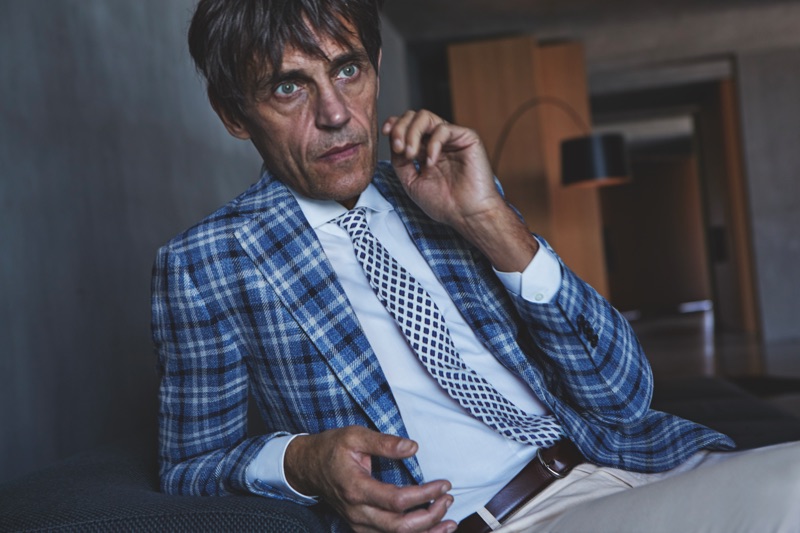 Didier Vinson dons a checked suit jacket by Luigi Bianchi Mantova.