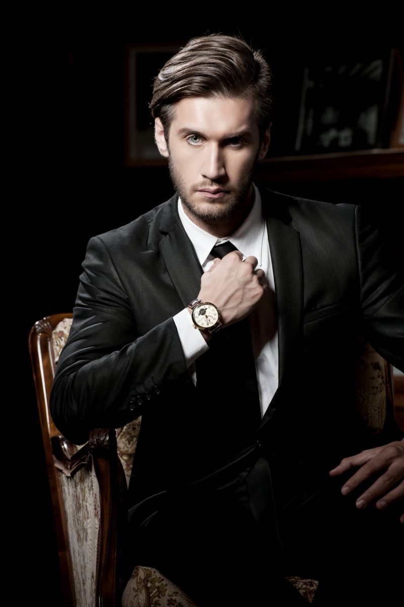 In which hand sales man wear wrist watch