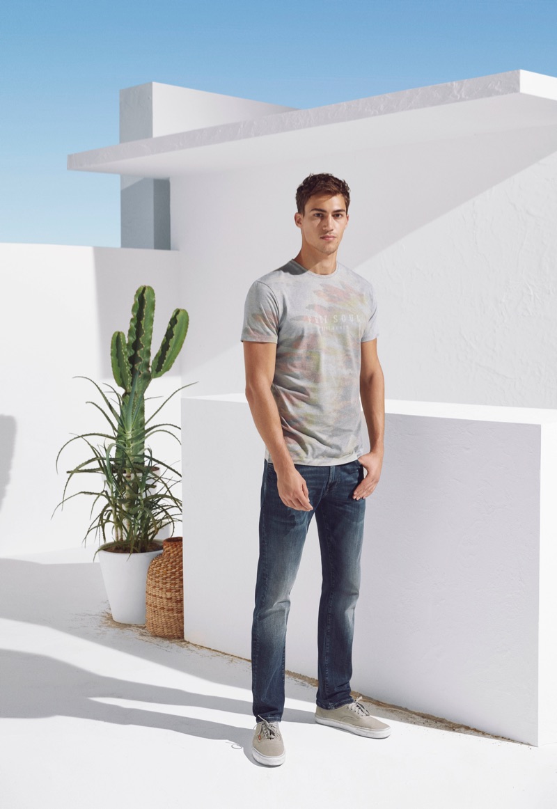 Alessio Pozzi rocks distressed denim jeans from Mavi's spring-summer 2019 lineup.