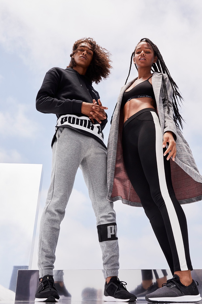 Models Leo Hoye-Egan and Selena Sloan go sporty in grey and black styles.