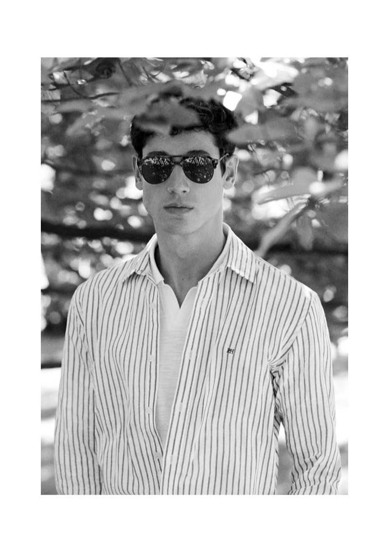 Connecting with Pedro del Hierro, Nicolas Ripoll wears a striped shirt.