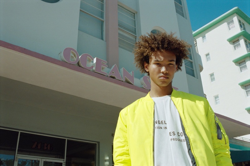 Standing out with a pop of color, Miles Anderson wears Pull & Bear.