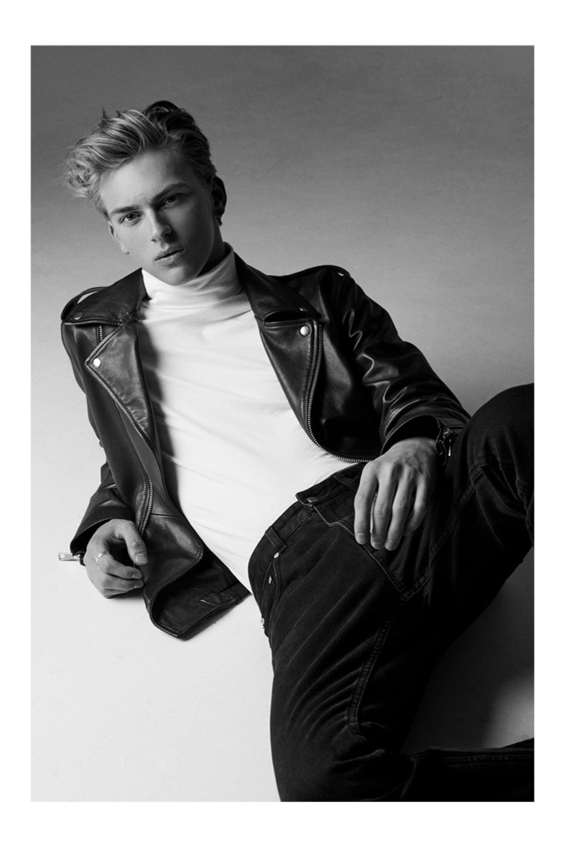 Sporting a leather biker jacket and turtleneck, Dominik Sadoch fronts Reserved outing.