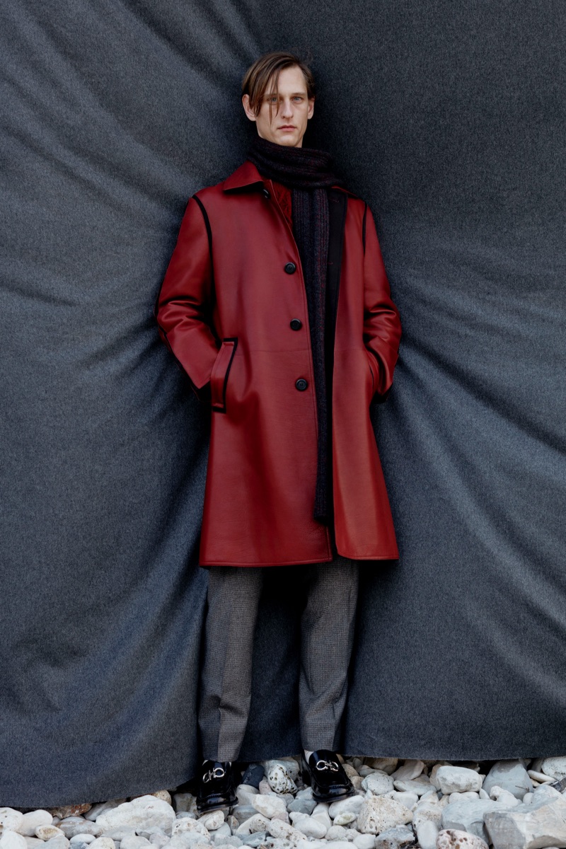 Standing out in a red coat, Rogier Bosschaart wears Salvatore Ferragamo.