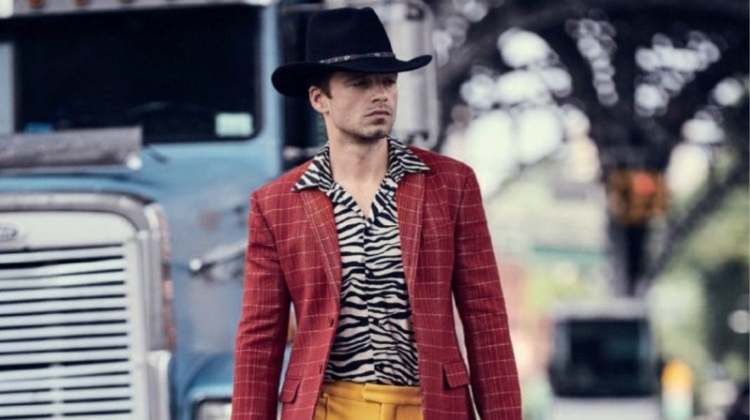 Heading out, Sebastian Stan wears a bold look from Bottega Veneta with a Jessie Western cowboy hat.