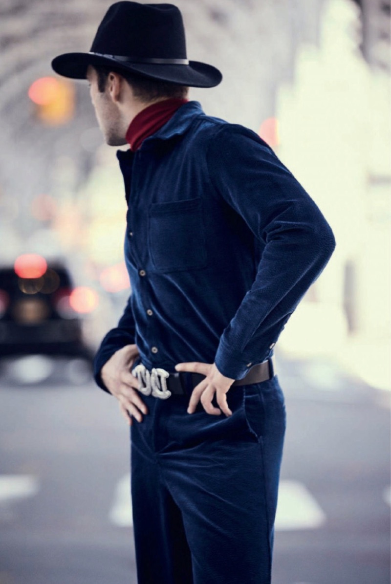 Actor Sebastian Stan wears a John Smedley shirt with a sweater and pants by King & Tuckfield. Stan also rocks a Dsquared2 belt and Jessie Western cowboy hat.