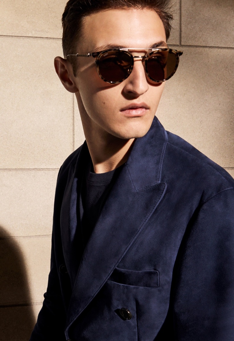 Sporting sunglasses, Anwar Hadid is captured "Backstage" for Tod's spring-summer 2019 campaign.