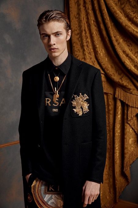 Embracing a tailored look, Lucky Blue Smith dons pieces from the Kith x Versace collection.