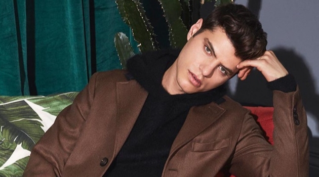Antonino Russo & Ben Bowers Model YOOX February Style Inspiration Antonino Russo showcases Valentine's Date inspiration with a single-breasted coat, brushed texture hoodie, and jeans from YOOX.