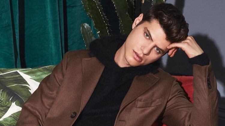 Antonino Russo showcases Valentine's Date inspiration with a single-breasted coat, brushed texture hoodie, and jeans from YOOX.