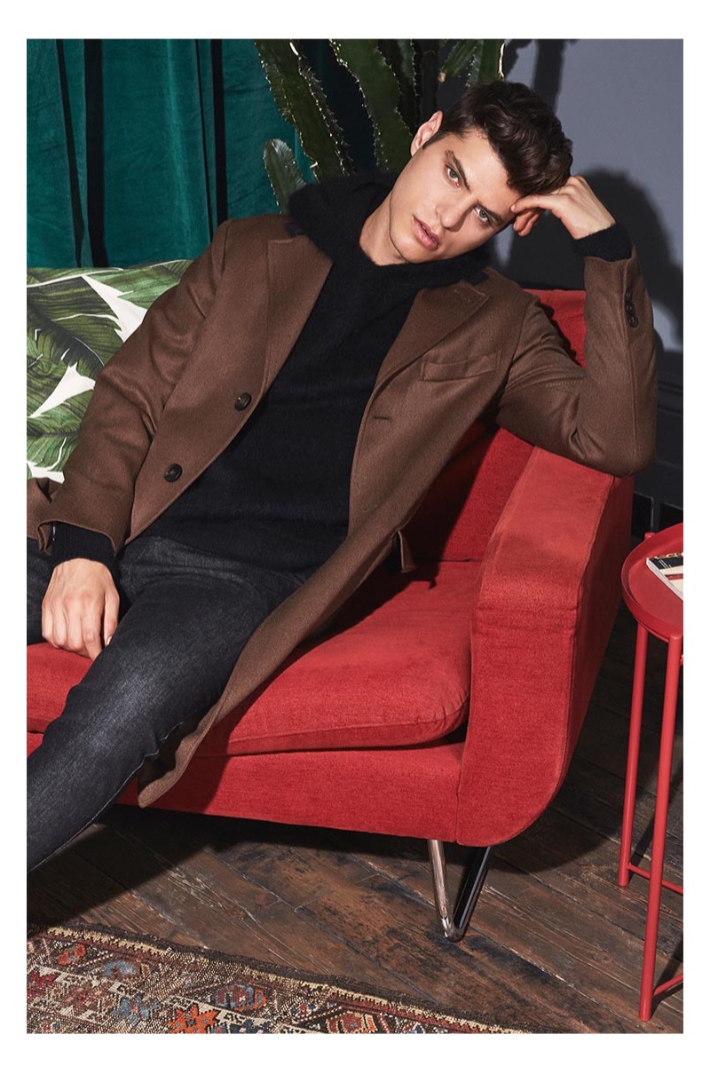 Antonino Russo showcases Valentine's Date inspiration with a single-breasted coat, brushed texture hoodie, and jeans from YOOX.