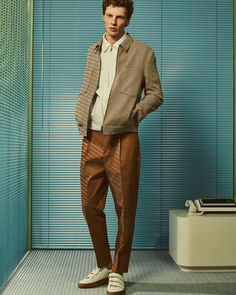 Embracing shades of brown, Tim Schuhmacher wears Zara Man.