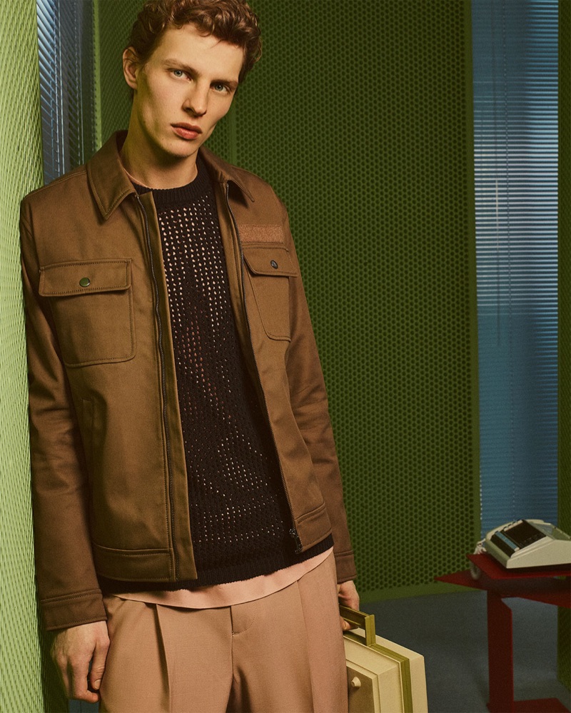 A sleek vision, Tim Schuhmacher wears brown hues from Zara Man.