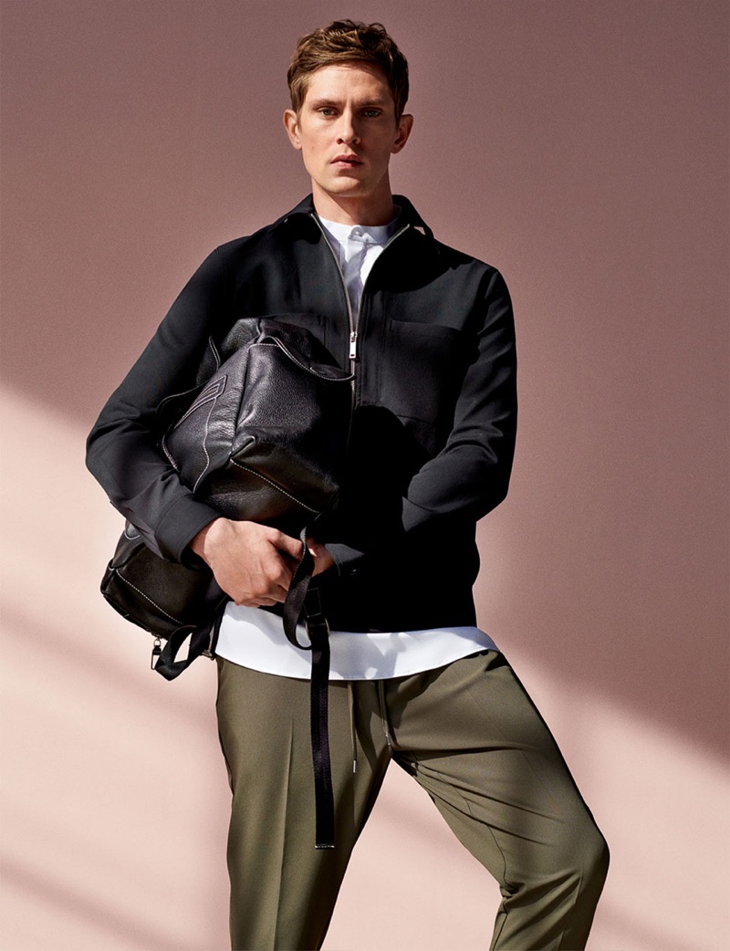 Mathias Lauridsen dons a blouson jacket with drawstring pants from Zara.