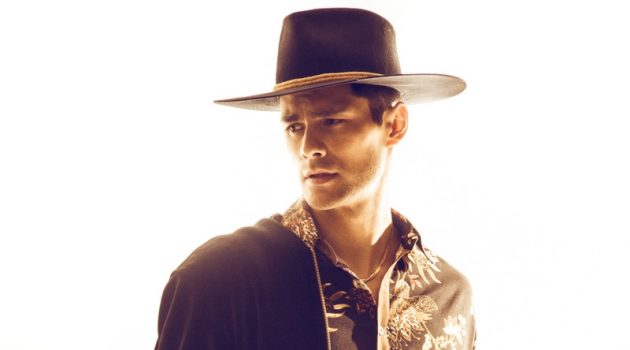 Beau Jensen is 'The Chameleon' Beau wears hat Coup De Tete, shirt, jacket, and pants Mayer Man.