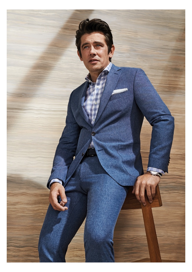 Model Werner Schreyer dons a blue suit from Carl Gross Black Line.