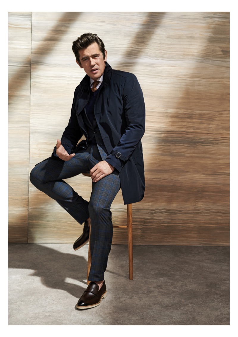 An elegant vision, Werner Schreyer wears tailoring by Carl Gross.