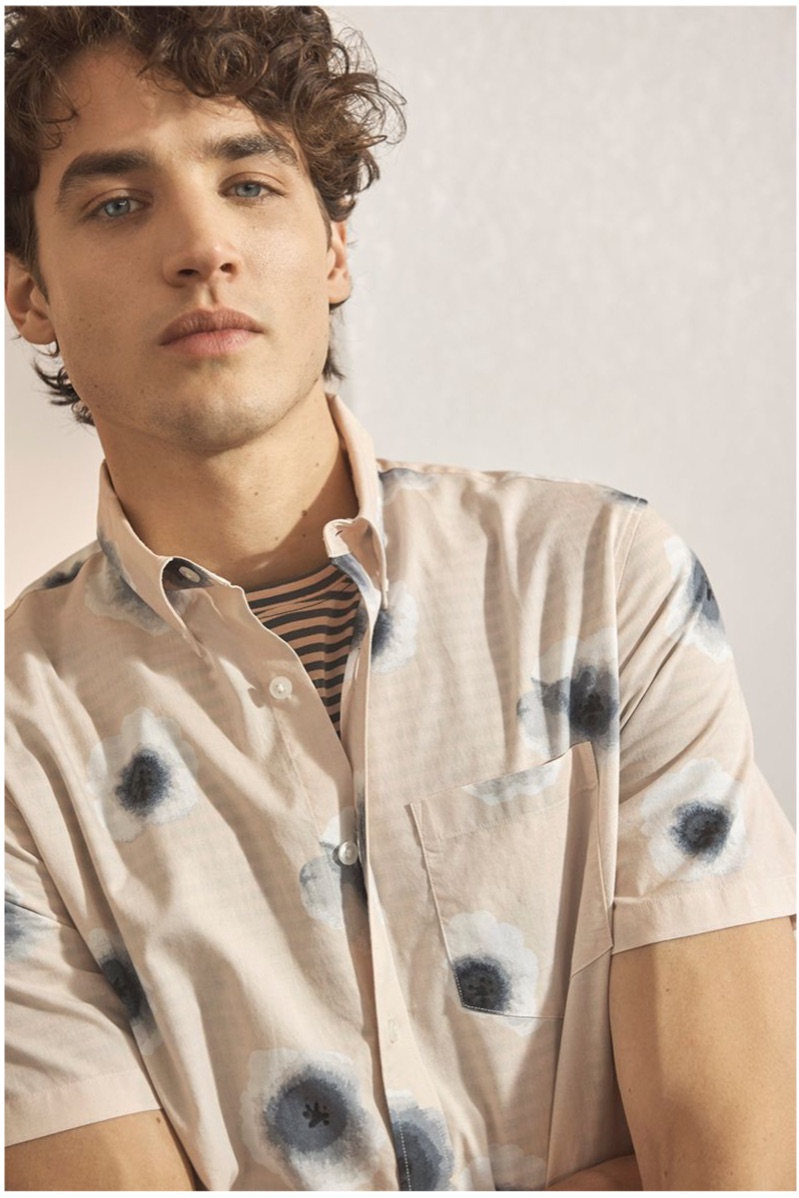 Federico Novello dons a Club Monaco "Morning Glory" shirt with a striped tee.